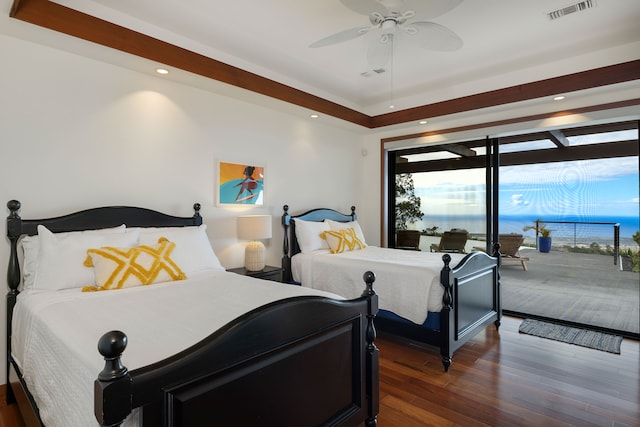 bedroom featuring ceiling fan and dark hardwood / wood-style floors