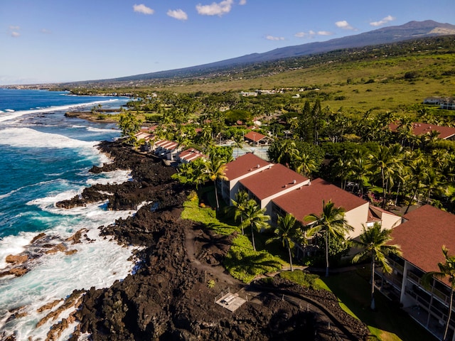 birds eye view of property featuring a water and mountain view