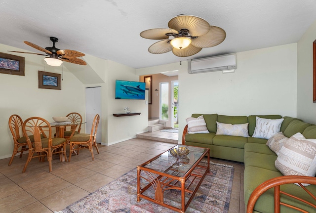 tiled living room with ceiling fan and a wall mounted air conditioner