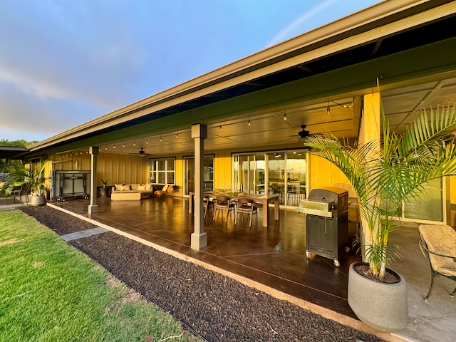 view of patio / terrace with area for grilling and ceiling fan