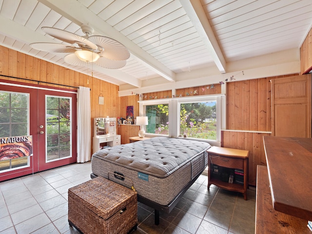 bedroom with french doors, access to exterior, beamed ceiling, wooden walls, and ceiling fan