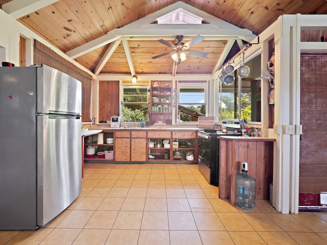 kitchen with wood ceiling, lofted ceiling with beams, and stainless steel appliances