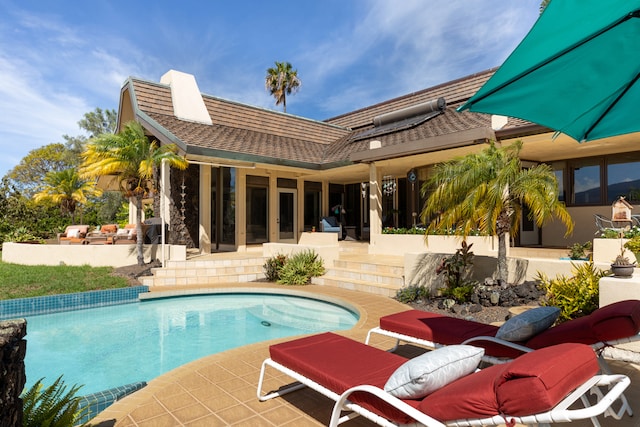 view of pool featuring a patio area