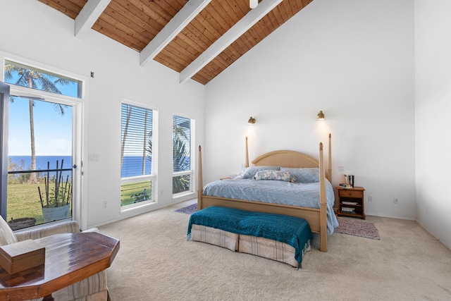 carpeted bedroom featuring a water view, wood ceiling, high vaulted ceiling, and multiple windows