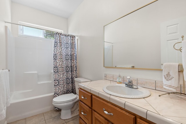 full bathroom with vanity, shower / tub combo, toilet, and tile patterned flooring