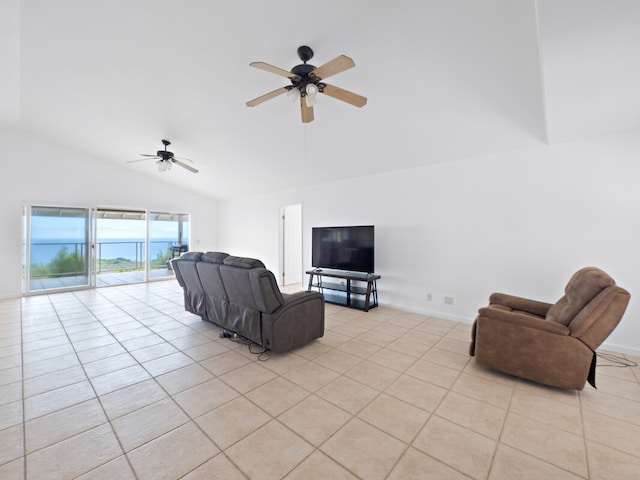 living room featuring light tile patterned flooring, lofted ceiling, and ceiling fan