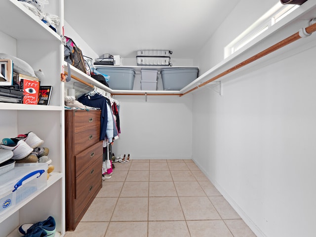 walk in closet featuring light tile patterned floors