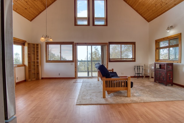 living room featuring wood ceiling, high vaulted ceiling, and light wood-type flooring