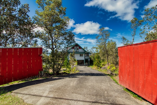 view of gate featuring a garage