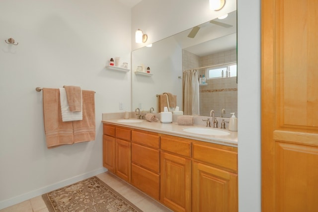 bathroom with vanity, a shower with curtain, and tile patterned flooring