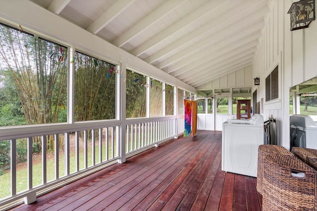 wooden terrace featuring washing machine and clothes dryer