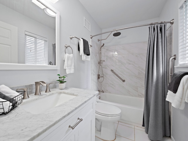 full bathroom with tile patterned flooring, shower / bath combination with curtain, toilet, and vanity