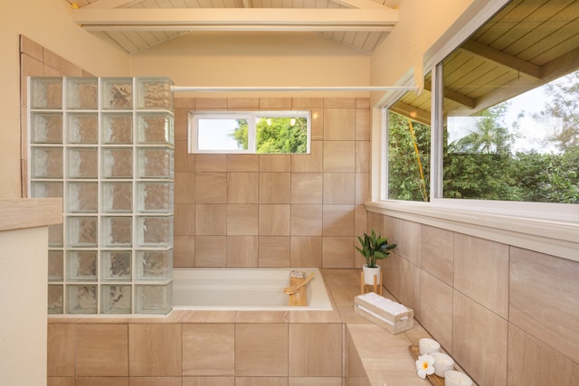 bathroom with lofted ceiling with beams, independent shower and bath, and wooden ceiling