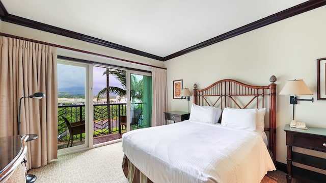 bedroom featuring ornamental molding and access to exterior