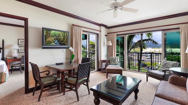 carpeted living room featuring ceiling fan and crown molding