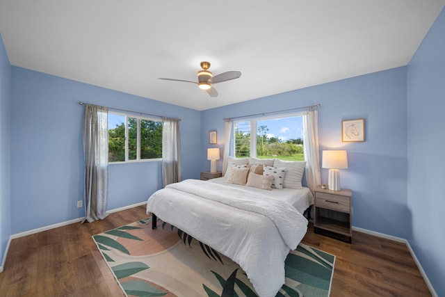 bedroom featuring dark wood-type flooring and ceiling fan