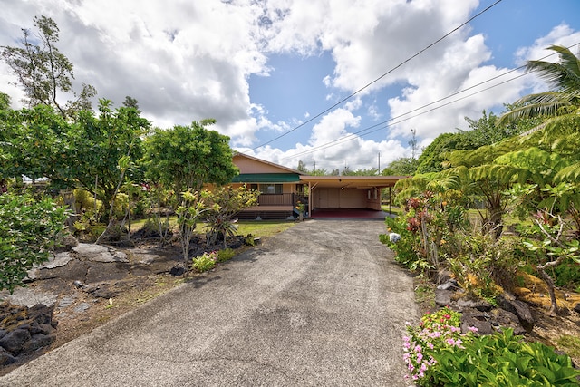 view of front of house with a carport