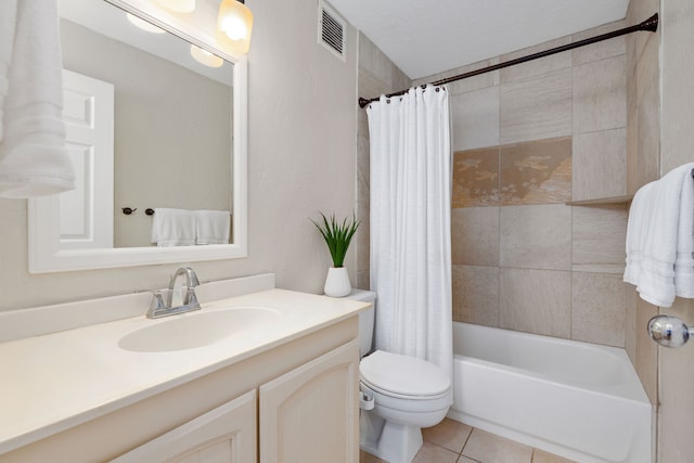 full bathroom featuring vanity, toilet, tile patterned floors, and shower / tub combo with curtain