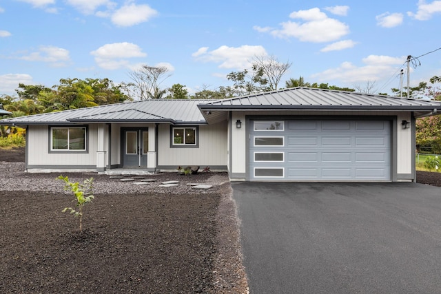 prairie-style home with a garage