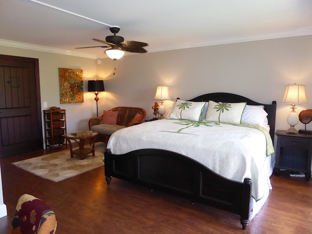 bedroom featuring ceiling fan, crown molding, and dark hardwood / wood-style floors