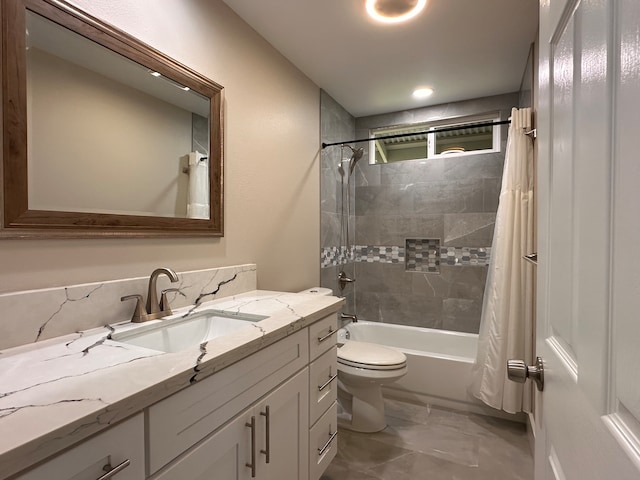 full bathroom featuring vanity, toilet, and shower / bathtub combination with curtain