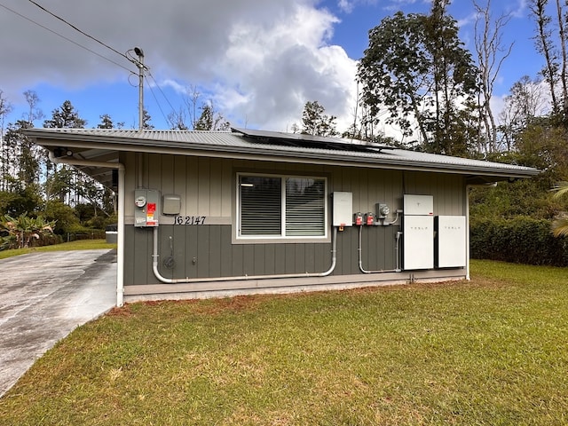 view of home's exterior featuring a yard