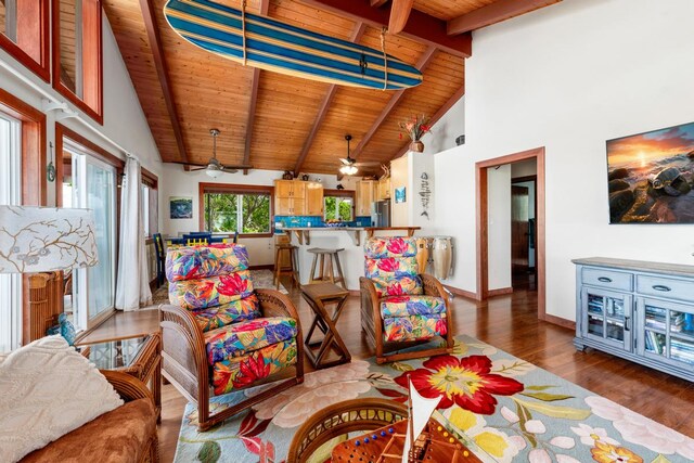 living room with high vaulted ceiling, ceiling fan, wooden ceiling, beamed ceiling, and hardwood / wood-style flooring