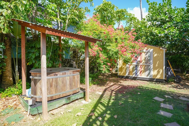 view of yard with a storage unit