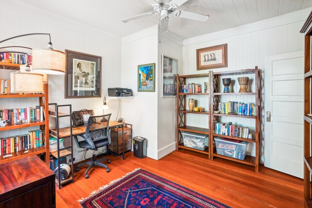 office space featuring ornamental molding, hardwood / wood-style floors, and ceiling fan