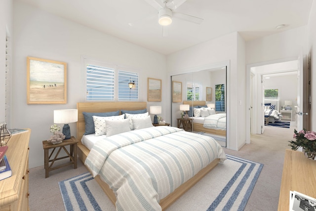 bedroom featuring a closet, light colored carpet, multiple windows, and ceiling fan