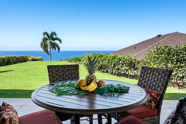 view of patio / terrace with a water view