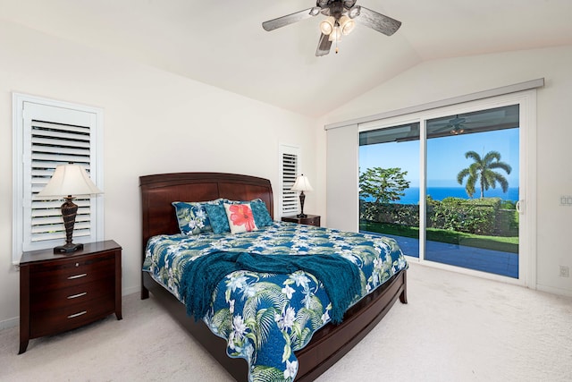 carpeted bedroom with ceiling fan, access to outside, and vaulted ceiling