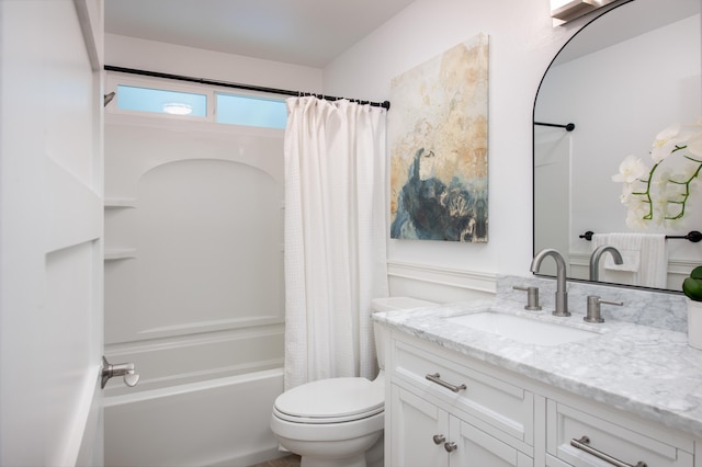 full bathroom featuring vanity, toilet, and shower / bath combo with shower curtain