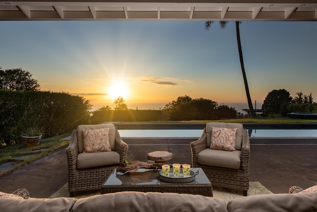 patio terrace at dusk with a water view