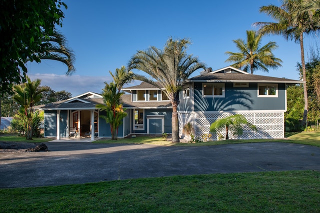 view of front of house with a front lawn