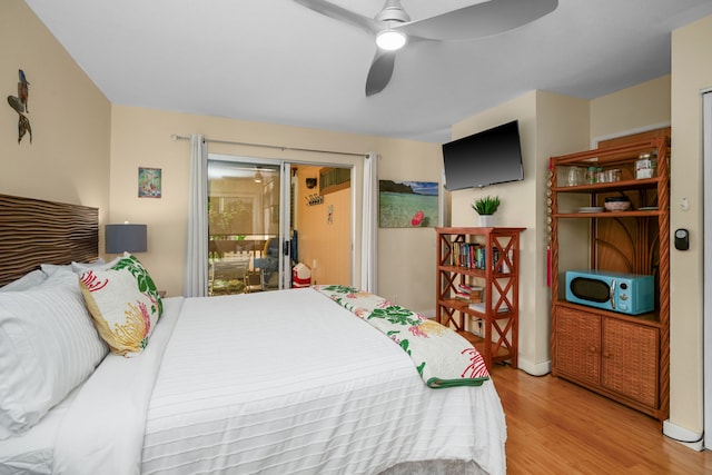 bedroom with light wood-type flooring and ceiling fan