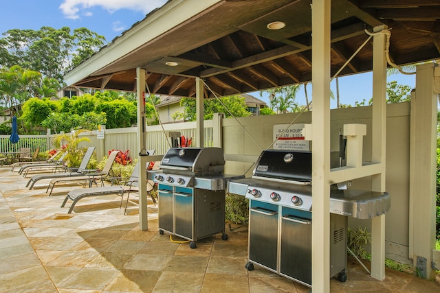 view of patio / terrace featuring area for grilling and a gazebo