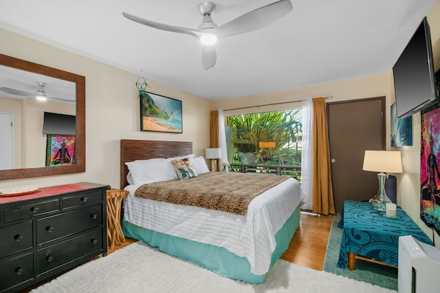 bedroom featuring light hardwood / wood-style flooring and ceiling fan