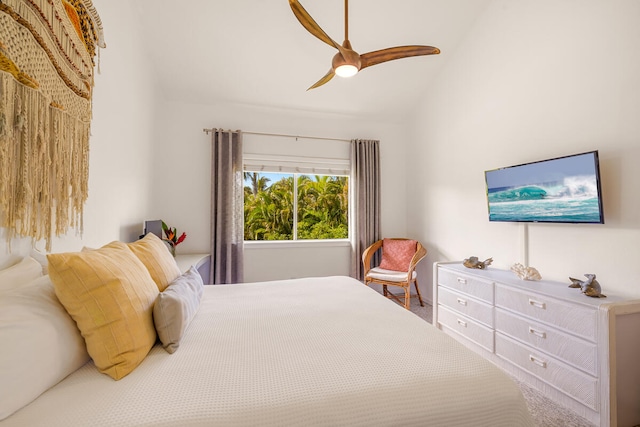 bedroom featuring lofted ceiling, carpet floors, and ceiling fan