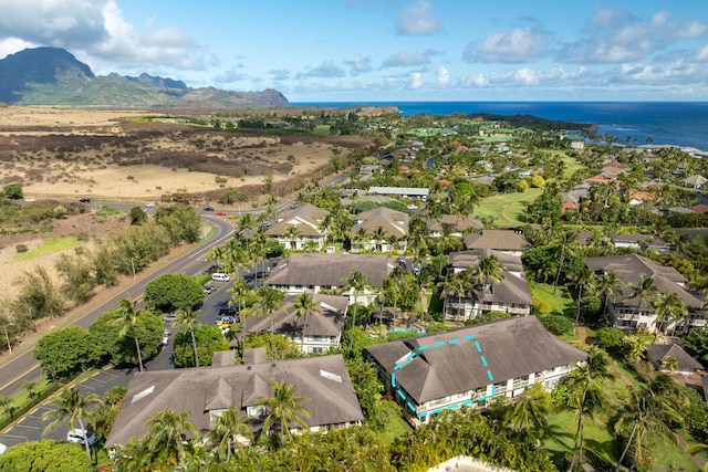 bird's eye view with a water and mountain view