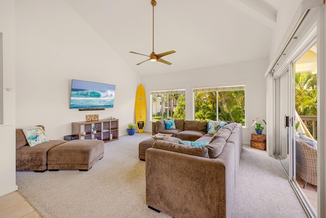 carpeted living room featuring high vaulted ceiling and ceiling fan