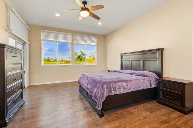 bedroom with hardwood / wood-style floors and ceiling fan