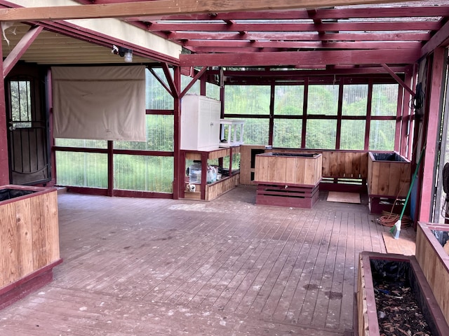 view of unfurnished sunroom