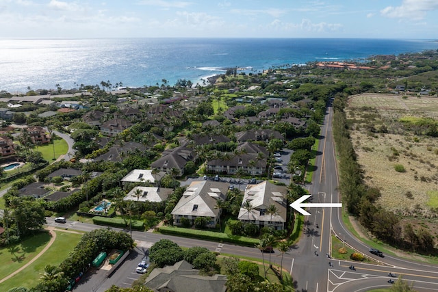 drone / aerial view with a water view