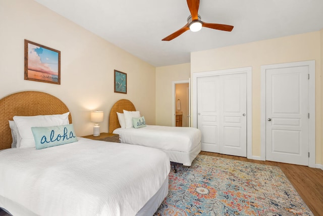 bedroom featuring light hardwood / wood-style floors and ceiling fan