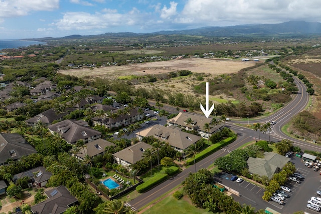 drone / aerial view featuring a mountain view