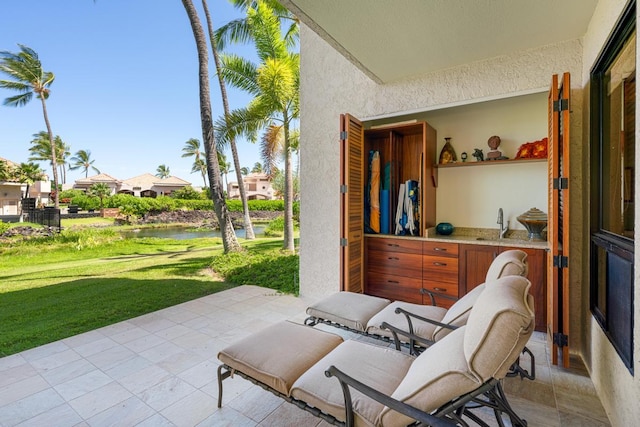 69-1035 Keana Pl Unit 113, Waikoloa, HI 96738 - view of patio / terrace featuring a water view