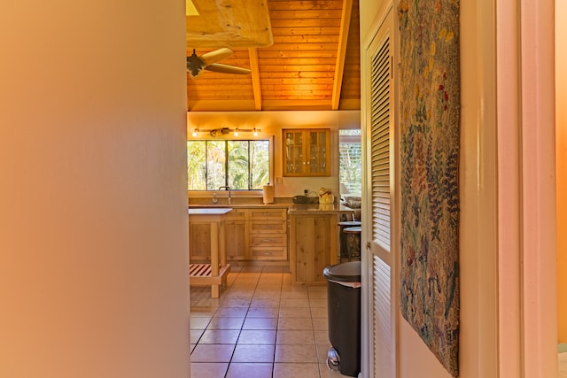 bathroom featuring wood ceiling, ceiling fan, lofted ceiling, and tile patterned flooring