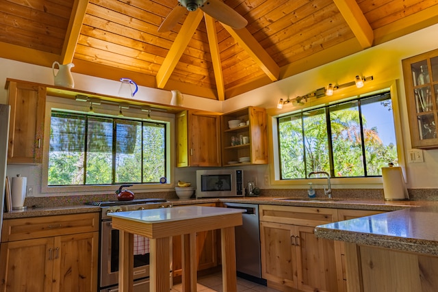 kitchen with wood ceiling, sink, lofted ceiling with beams, light tile patterned floors, and appliances with stainless steel finishes