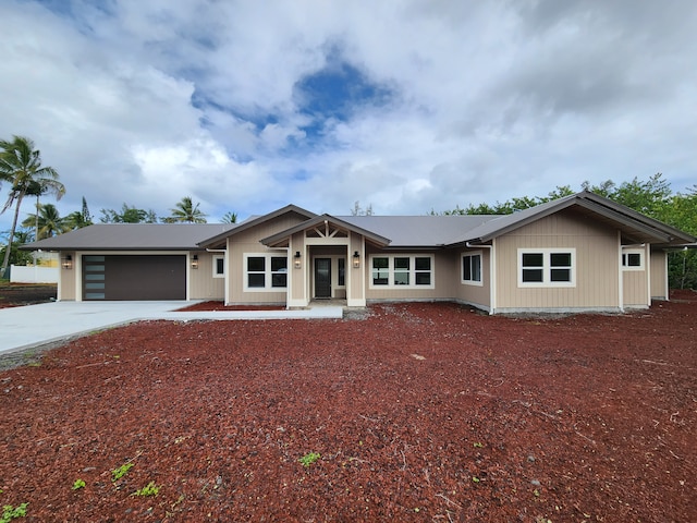 single story home featuring a garage